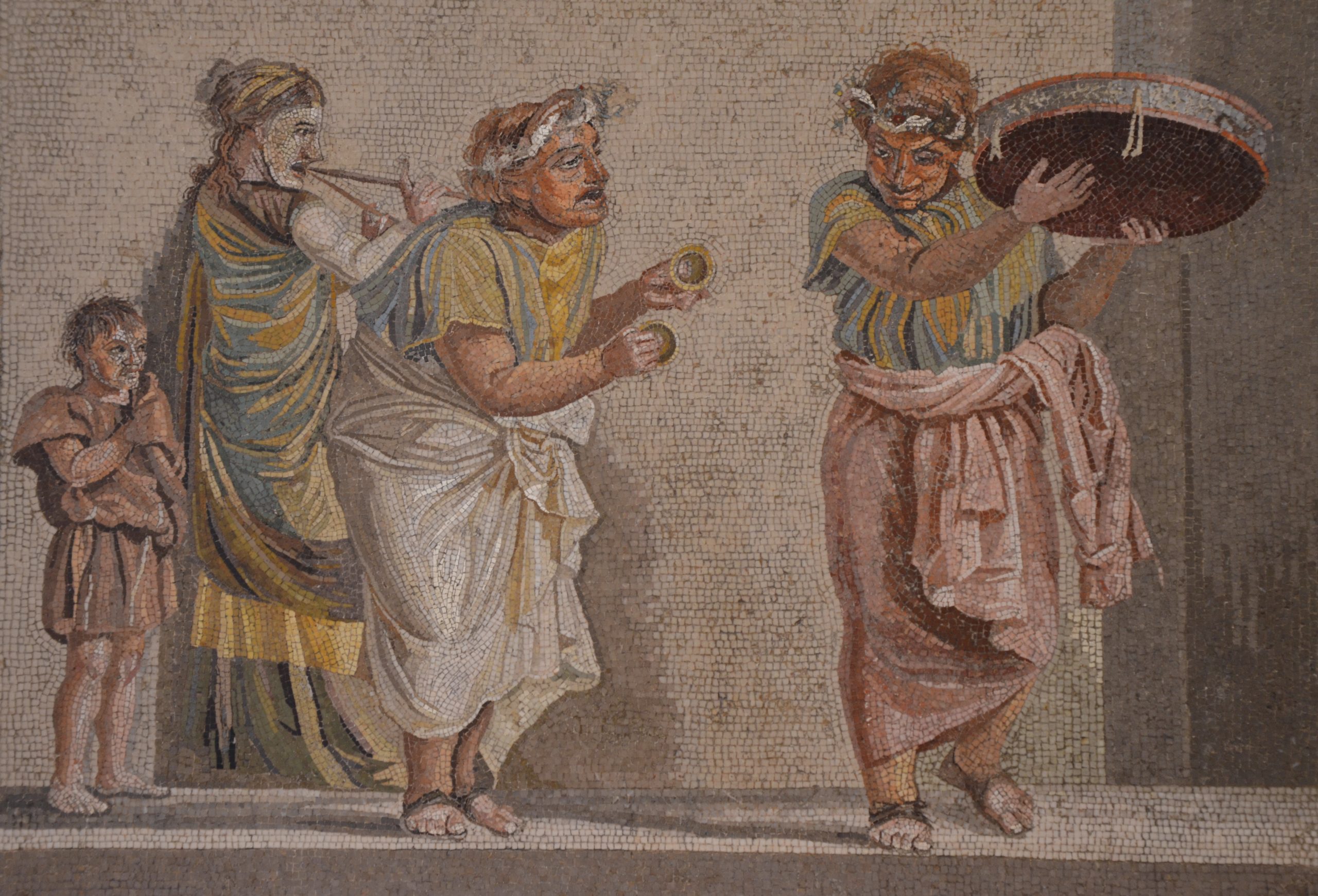 Mosaico antico romano firmato Dioskourides di Samo raffigura musicisti di strada con strumenti a fiato e percussioni